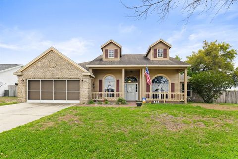 Photo of 124 Country Lakes Circle, Groveland, FL 34736 (MLS # O6391377)