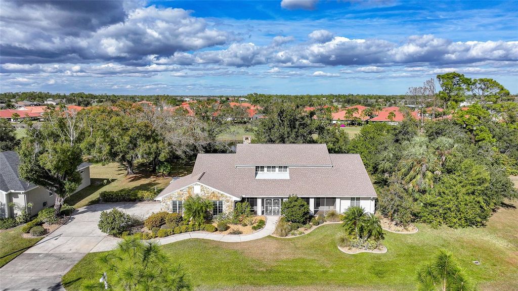 Photo of 24358 SW Kingsway Circle, Lake Suzy, FL 34269 (MLS # C7519813)