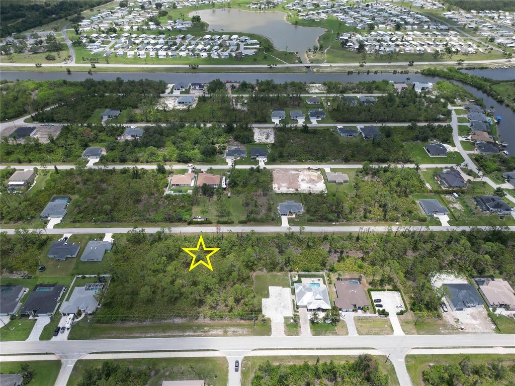Photo of 14161 Naylor Avenue, Port Charlotte, FL 33981 (MLS # D6142725)