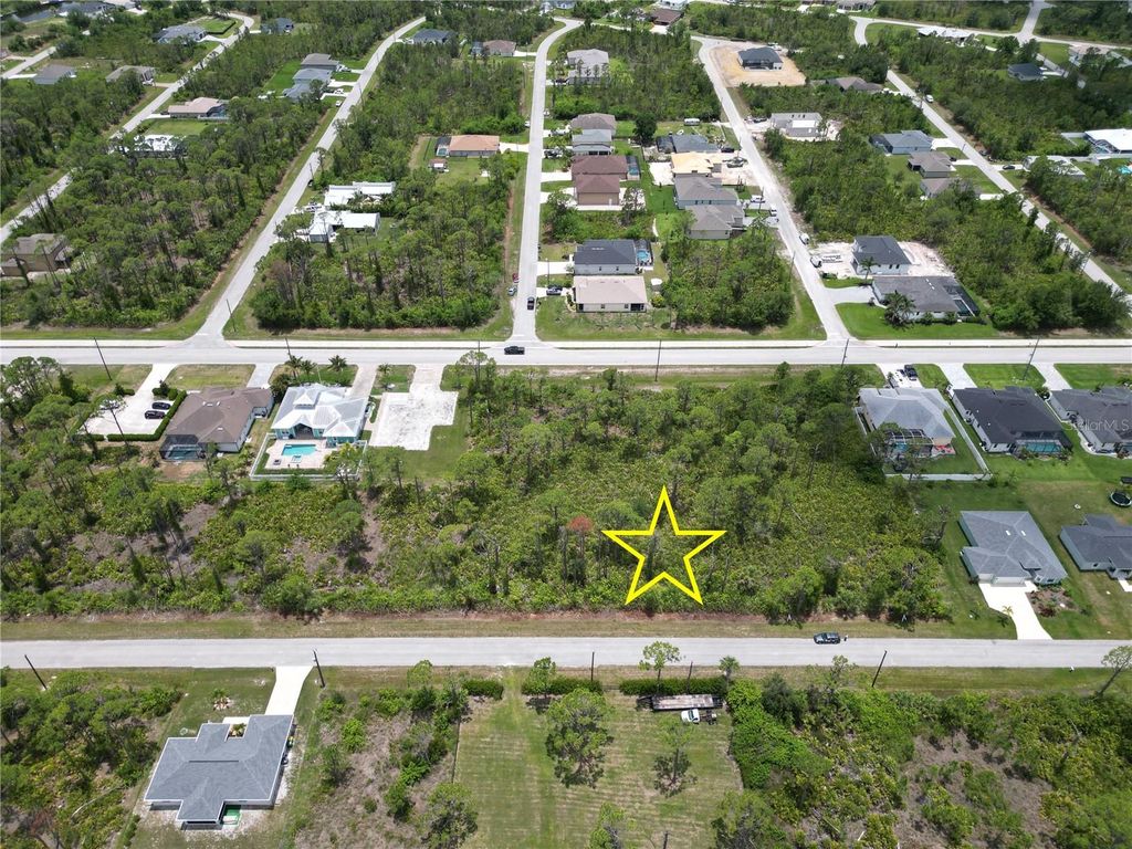 Photo of 14161 Naylor Avenue, Port Charlotte, FL 33981 (MLS # D6142725)