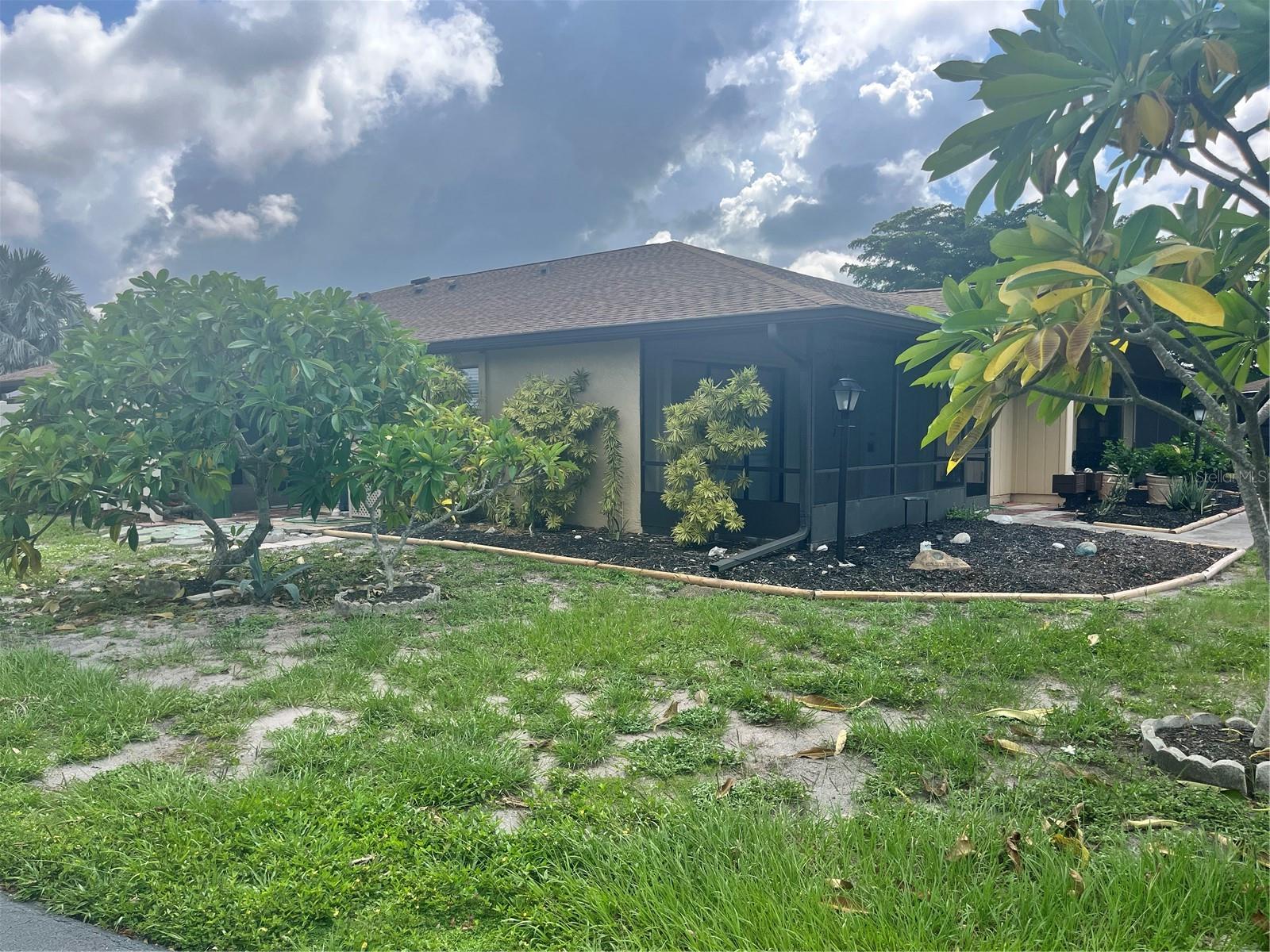 You're Almost to the beach in this 2 bedroom 2 bath villa in a 55 and over community. Freshly painted and brand new carpet. Kitchen, utility room and both baths are ceramic tile. Living area and kitchen are open areas to each other with a breakfast bar in between. Eating area in the kitchen. Lots of counter space and cabinets to make your kitchen duties much more enjoyable. Both bedrooms have sliding glass doors that go out to covered lanai's for extra enjoyment. The rear lanai/porch has a storage closet for a place to keep some of your stuff. The utility room, off the kitchen has the washer/dryer hookups and the hot water heater plus extra room for storage. The community has a swimming pool and clubhouse for your enjoyment if you don't want to go to the beach. Convenient to shopping and lots of great restaurants are close by. The community is well maintained and attractive so you can feel good about where you are.