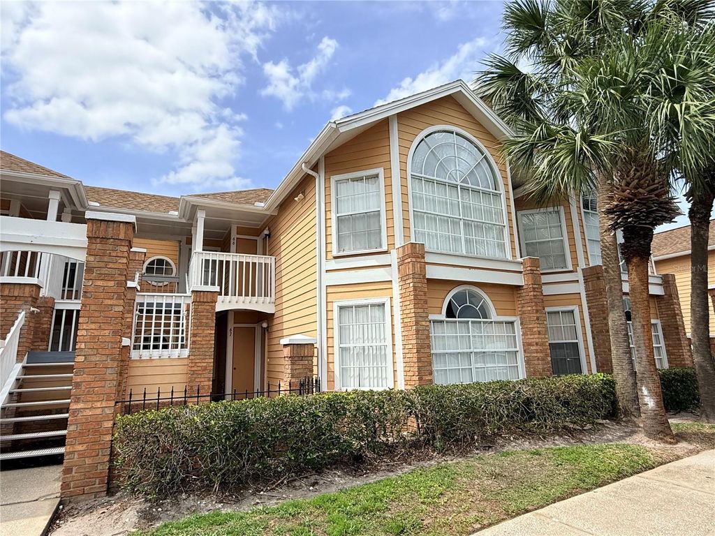 Photo of 2490 Sweetwater Club Circle #67, Kissimmee, FL 34746 (MLS # S5151259)
