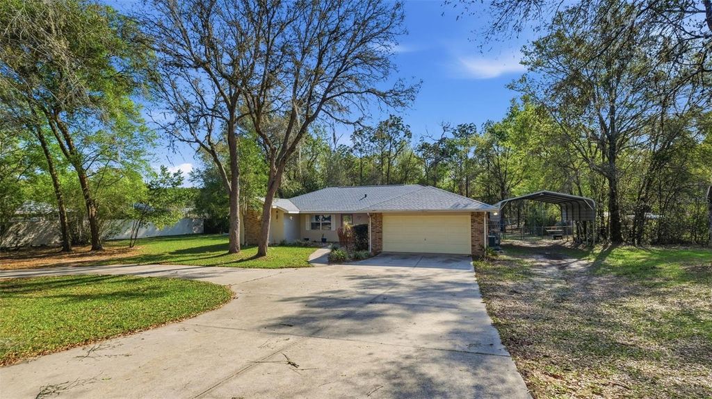 Photo of 12435 S Canna Point, Floral City, FL 34436 (MLS # TB8492022)