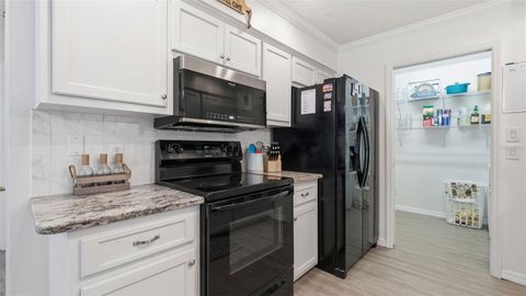 Tiny photo for 12435 S Canna Point, Floral City, FL 34436 (MLS # TB8492022)