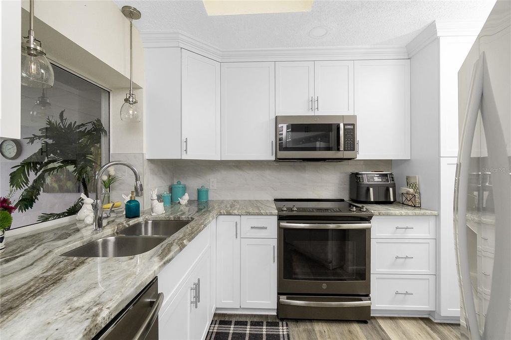 Photo of 330 Weber Terrace, Port Charlotte, FL 33952 (MLS # C7511433)