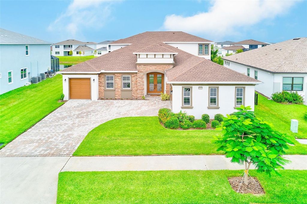 Photo of 8717 Sanders Tree Loop, Wesley Chapel, FL 33545 (MLS # TB8403191)