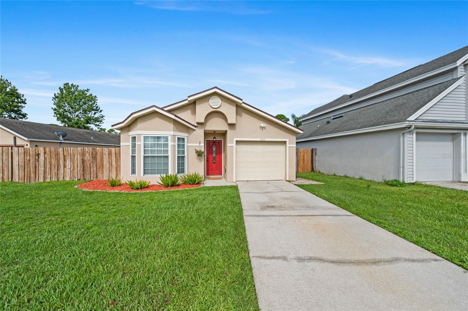 One or more photo(s) has been virtually staged. Welcome to this beautifully maintained 3-bedroom, 2-bath pool home in the highly sought-after community of Alafaya Woods in Oviedo, offering the perfect blend of comfort, style, and convenience for new homeowners. Step inside and you’ll be greeted by a charming entry hall with wainscoting with shaker peg rails, leading into ample living areas featuring lovely eucalyptus engineered wood flooring throughout and designer tile in the baths. The heart of the home includes a kitchen with a bay window, eat-in space, and all appliances conveying for your convenience, including a 2021 refrigerator. A separate laundry room provides added functionality and includes newer washer and dryer. The primary suite is a true retreat, offering a walk-in closet and a beautifully renovated bath complete with a clawfoot bathtub and a large separate shower. The hall bath also has been tastefully updated, and bedroom 2 features French doors with built-in blinds that open directly to the screened-in patio overlooking the sparkling crystal-clear saltwater pool with a new salt cell, all set against a serene conservation view for added privacy. Side and rear paver walkways create effortless access throughout the property. Additional features and updates that provide peace of mind, include double-pane windows, a brand-new roof (2025), new plumbing (2022), and water heater (2017), and the home comes with a wired Ring Video Doorbell, wired Ring Floodlight Cam, and a 2-10 Home Warranty for one year. With a fenced backyard, one-car garage, and a layout that invites both relaxation and entertaining, this property is move-in ready. Beyond the home, Alafaya Woods offers tree-lined streets, lush landscaping, a park, tennis and basketball courts, playground, covered picnic areas, and peaceful walking trails. Families will appreciate access to some of Central Florida’s top-rated schools, while the location places you minutes from UCF, Seminole State College, Oviedo on the Park, and the Aquatic Center. This home is the perfect opportunity to enjoy Florida living at its finest. Call today to schedule your private tour!