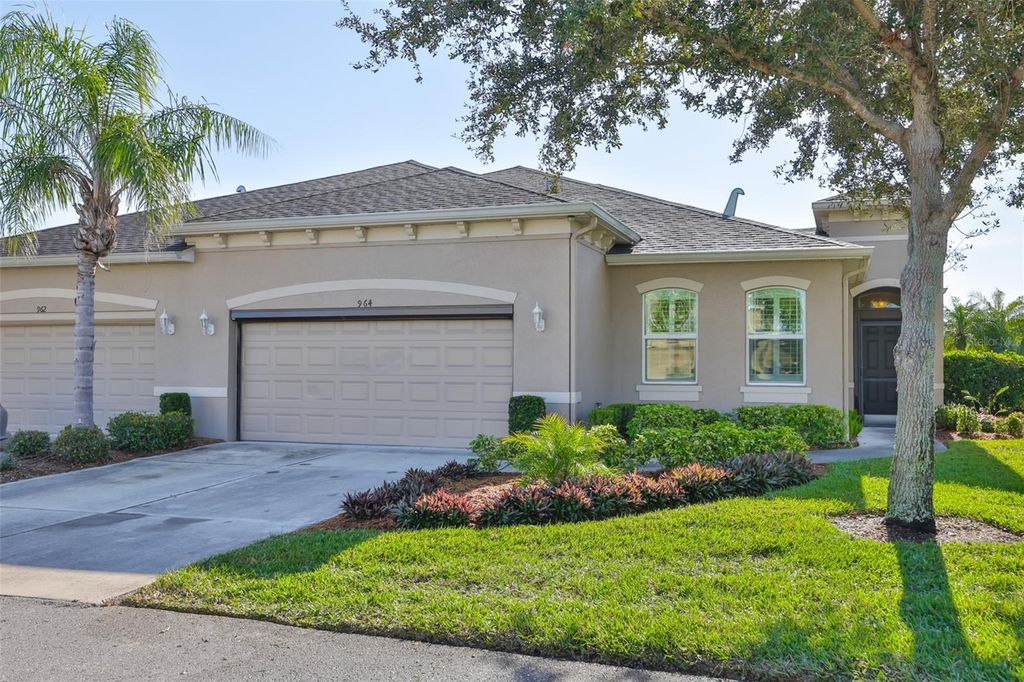 Photo of 964 Pembroke Point Way, Sun City Center, FL 33573 (MLS # TB8464483)
