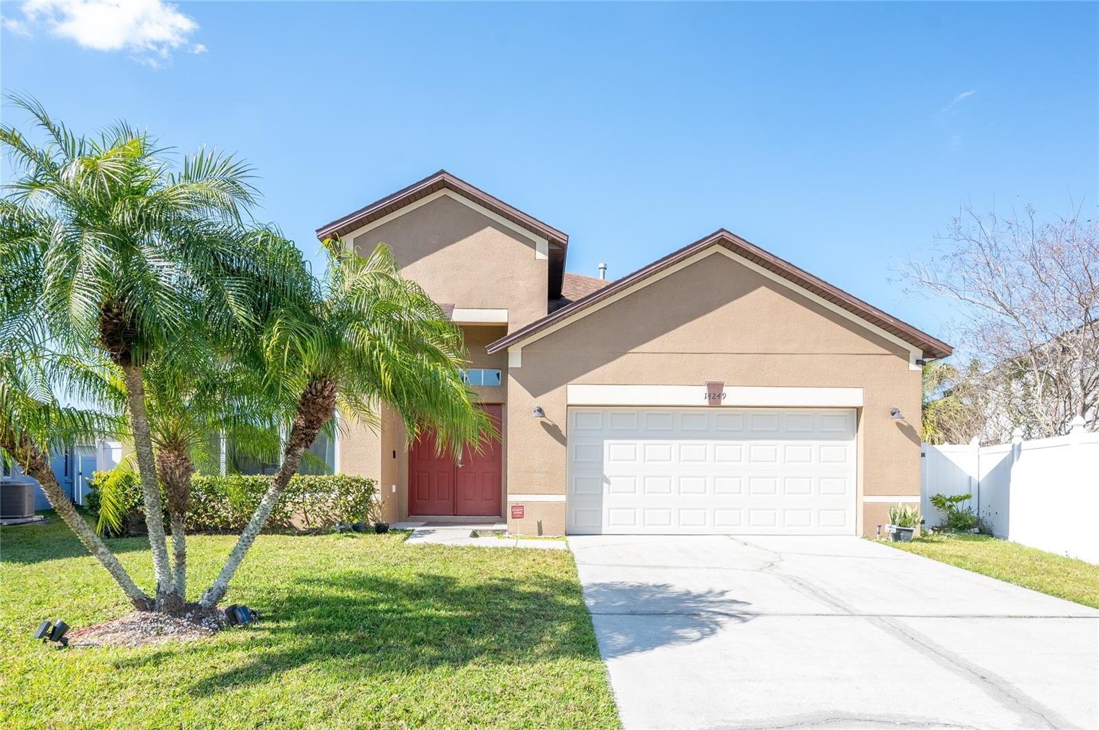 Welcome to this beautiful and updated home in the heart of East Orlando. This 4-2 home offers a convenient split floor plan with space and functionality for all to enjoy. Enjoy the fully equipped kitchen with granite countertops, island, stainless steel appliances, and two pantries for all your storage needs. Beautiful owner's suite with ample walk-in closet, master bath, 3 additional bedrooms, guest bathroom, laundry room and open living/dining room complete the interior of this well cared property. Once outside you will find a spacious screened porch, hot tub and a fully fenced backyard. This home has beautiful ceramic tile in all common areas, new carpet in bedrooms, windows replaced (2019), water heater(2018) new SMART garage door. The community offers a pool, tennis court, playground and includes cable and internet! Conveniently located close to the area amenities, such as Waterford Lakes shopping, Avalon Park, UCF, restaurants, movie theatres, 25 min from MCO airport, you don't want to miss this opportunity to own a slice of paradise in East Orlando. Your dream home awaits!