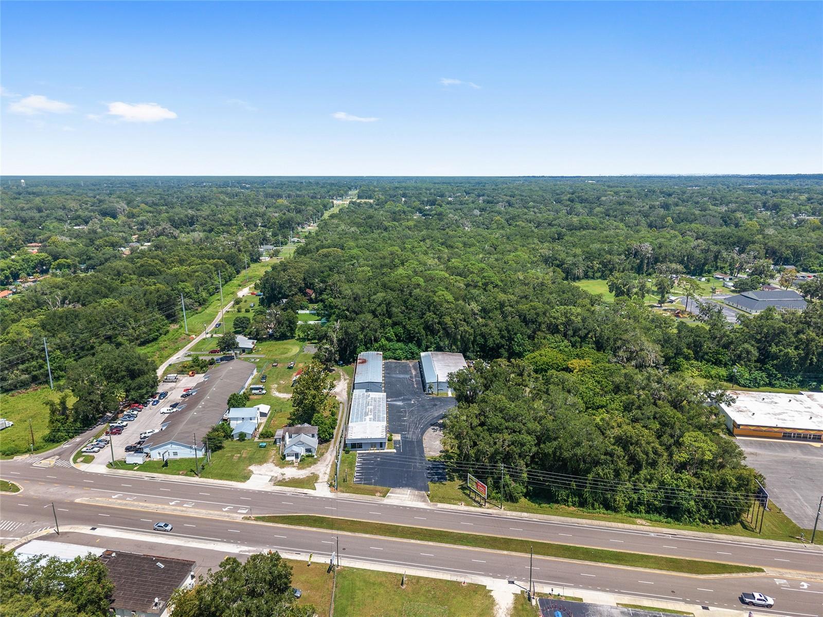 This is a unique opportunity to acquire a multi-tenant, income-producing commercial property located in a high-traffic area with excellent visibility and long-term upside. The asset features a stable self-storage operation, street-facing retail storefront space ideal for tenant or owner use, a convertible warehouse plus loading dock access convenient for logistics & deliveries, all on B-5 zoned land. Additional adjacent B-2 zoned parcels are included, offering valuable expansion or redevelopment potential. In addition, there are two billboards on the property for extra income. The high visibility location is ideal for exposure and signage, ideal for investors in search of diverse revenue streams.