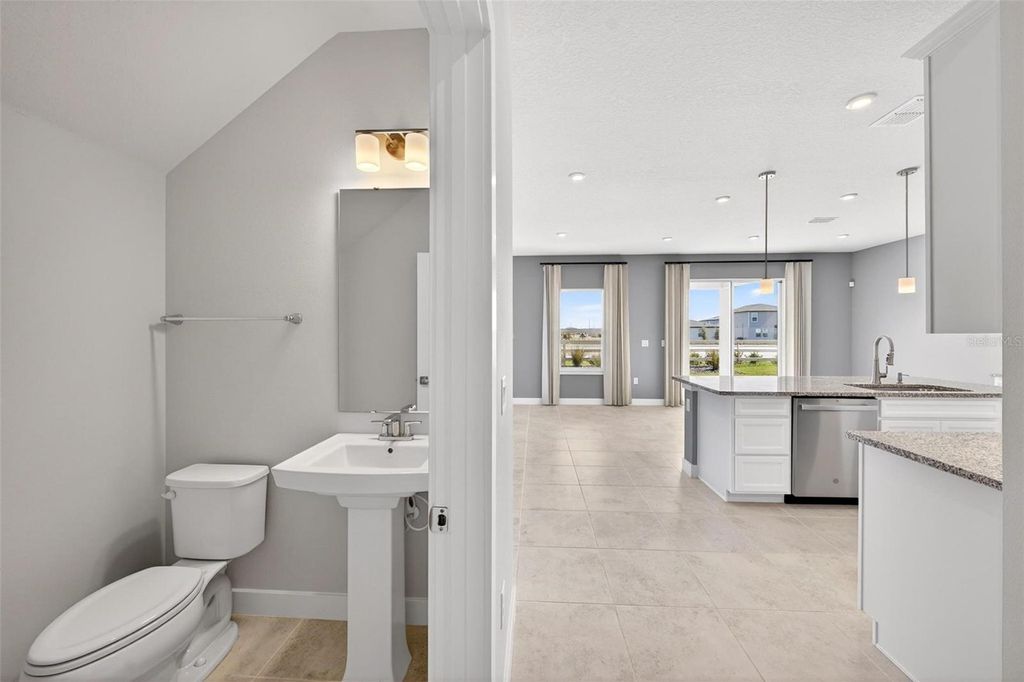 Photo of 6408 Domizio Drive, Winter Haven, FL 33884 (MLS # O6378562)