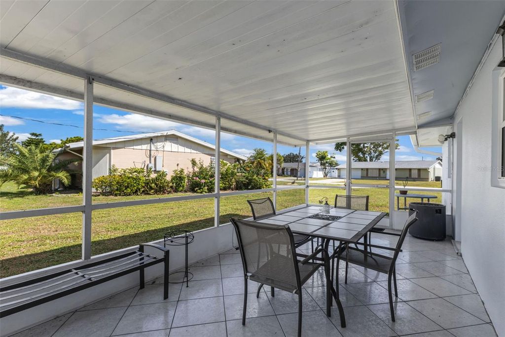 Photo of 3444 Elkcam Boulevard, Port Charlotte, FL 33952 (MLS # C7515312)