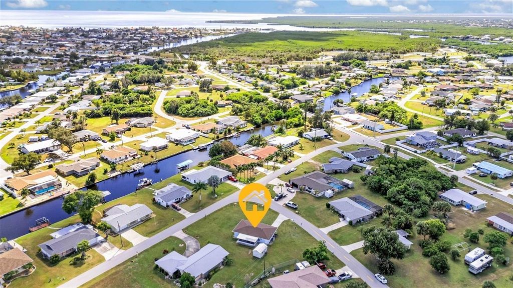 Photo of 3444 Elkcam Boulevard, Port Charlotte, FL 33952 (MLS # C7515312)