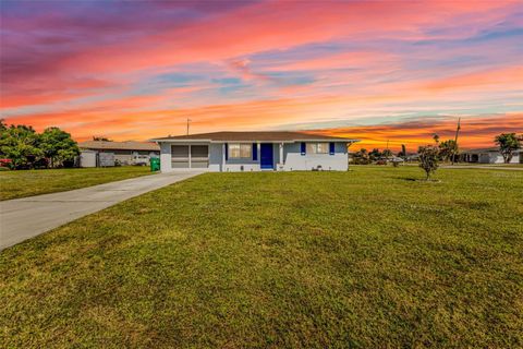 Photo of 3444 Elkcam Boulevard, Port Charlotte, FL 33952 (MLS # C7515312)