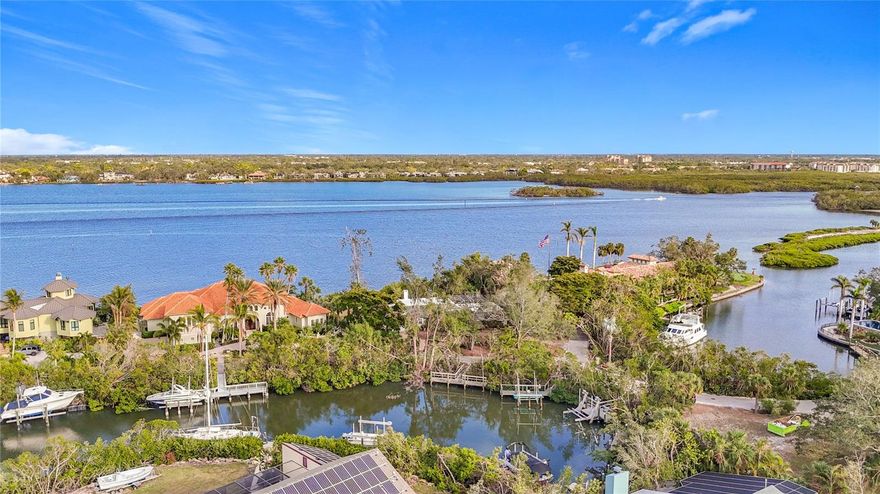 IMAGINE owning nearly 3/4 of an acre on the exquisite Sarasota Bayfront! Your imagination can become reality on the northern end of world-renowned Siesta Key!  This incredible property is perfect for living the true island life that you imagine! This dream property is located in Hidden Harbor only minutes from the famous Siesta Key Village as well as the #1 Beach in the United States and is conveniently situated to enjoy all the amenities beautiful Sarasota has to offer!  Spanning almost 150 feet of direct Bayfront, this estate lot provides the perfect canvas for your custom waterfront dream home! This property's generous dimensions allow for an expansive main residence, extensive landscaping and multiple outdoor living spaces.  This property represents one of the rare opportunities to build a custom Bayfront estate on Siesta Key.  It’s prime location, size and views make it an exceptional choice for those seeking to create their ideal Florida home. Enjoy unobstructed breathtaking views over tranquil Robert’s Bay year-round from your private beach area.  You can design this precious gem to make it your own with a custom-built home designed to your specific taste or remodel the existing home to your choice of finishes and personal touches and create your ultimate island lifestyle!   Don't let this piece of island paradise slip away!