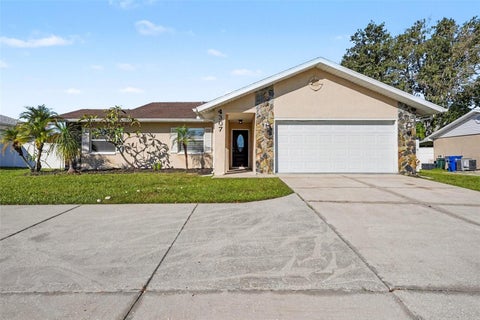 Photo of 4307 Wood Trail Boulevard, New Port Richey, FL 34653 (MLS # O6450370)