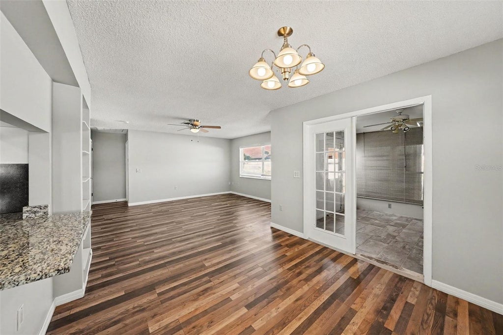 Photo of 4307 Wood Trail Boulevard, New Port Richey, FL 34653 (MLS # O6450370)
