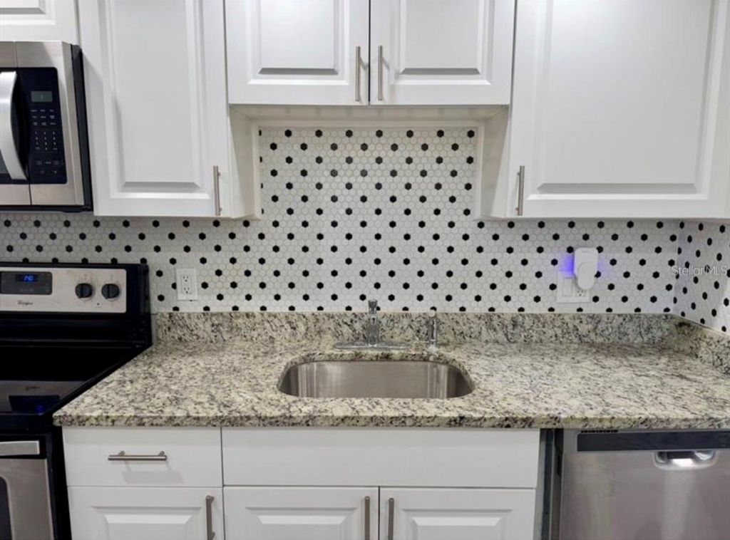 Photo of 6312 Newtown Circle #12C2, Tampa, FL 33615 (MLS # TB8495875)