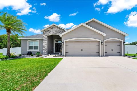 Photo of 1061 Sandpiper Loop, Winter Haven, FL 33881 (MLS # O6412012)