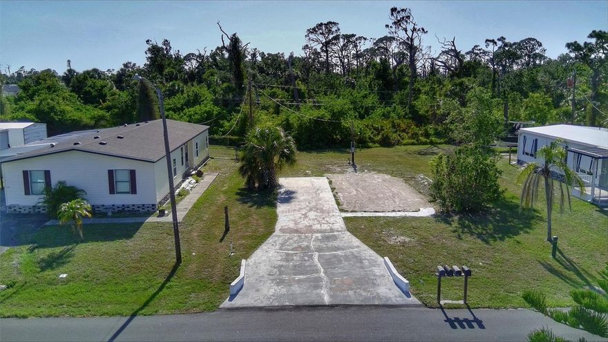 Build Your Dream Home in Manatee Cove of Englewood!

Welcome to Manatee Cove of Englewood (formerly known as Holiday Mobile Estates), a deed-restricted 55+ boating community where you own your land and enjoy the Florida lifestyle just minutes from Englewood Beach. This cleared 7,500 sq. ft. lot is ready for your custom home—with water and sewer already connected, saving you thousands on costly impact fees!

Nestled on a quiet street with a serene preserve view, this lot offers both privacy and a peaceful natural setting. Whether you're looking to build a full-time residence or a seasonal retreat, this is a rare opportunity to create something truly special in a well-established community.

Optional HOA dues are just $110/year, granting access to a private community boat ramp with saltwater access to the Gulf, plus a host of social amenities including bingo, shuffleboard, pickleball, yoga, dances, and more! (Visit www.manateecoveenglewood.org for details.)

Opportunities like this don’t come often—especially with utilities in place and views like this. Don’t miss your chance to bring your vision to life in one of Englewood’s most welcoming and affordable boating communities!