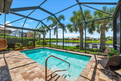 Photo of 7612 Kirkland Cove, Bradenton, FL 34202 (MLS # A4662412)