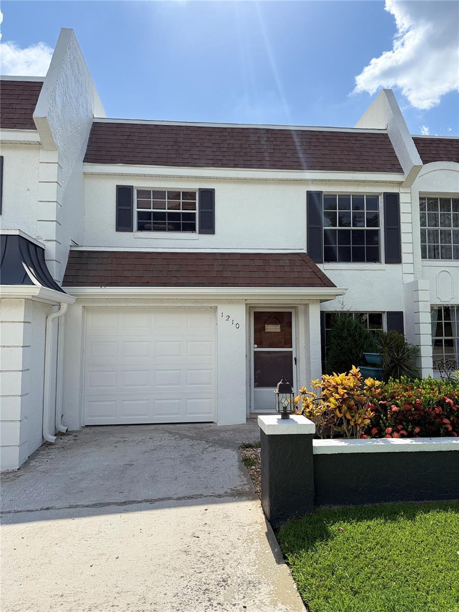 Lakefront Living with Private Dock & Downtown Clermont Charm! Don’t miss this rare opportunity to own an updated lakefront home with direct access to the Clermont Chain of Lakes via your private dock on Lake Winona. Located just a short stroll from historic downtown Clermont, enjoy live music, farmers markets, food trucks, and community events all year long. This intimate complex offers only 7 units with low HOA fees, ensuring peace and privacy. Inside, you’ll love the new luxury wood vinyl plank flooring (2024), freshly repainted exterior (2025), and all-new kitchen appliances (2024). The flat roof was recoated in December 2023, the patio roof replaced in January 2025, and new gutters added in 2025—everything has been done for you. Relax or entertain on your covered, screened-in porch, complete with a pass-through window from the kitchen—ideal for lakeside BBQs. Storage won’t be an issue with an additional 10x10 storage unit below the living space and a one-car garage. The A/C was replaced in 2022 for year-round comfort. Centrally located, you’re a short drive from Orlando’s world-class theme parks, downtown Orlando, and the charming streets of downtown Winter Garden. This home is the perfect blend of lake life, cultural access, and low-maintenance living.