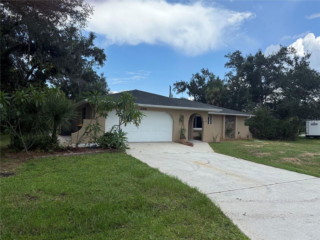 Photo of 21300 Washburn Avenue, Port Charlotte, FL 33952 (MLS # A4662838)