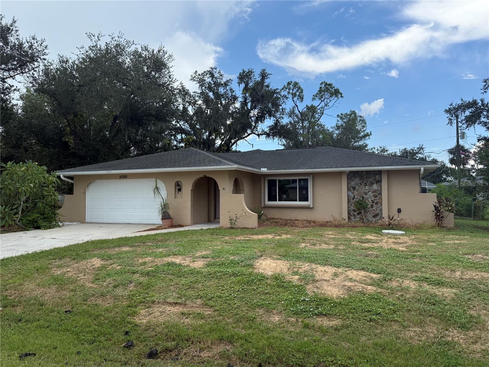 ANNUAL RENTAL!! MOVE IN READY!! This 2 bedroom 2 bath, 2 car garage property offers a spacious and bright interior complete with A HUGE BONUS ROOM and as well as a FENCED IN BACK YARD. Situated on 3 LOTS, your new home comes with freshly painted interior and exterior, new septic system, new electrical, new ceiling fans, new bathroom vanities with granite tops, new doors and trim throughout the house, hurricane shutters, and brand new windows. AND TALK ABOUT LOCATION... your new home is ideally located so you can enjoy unique local cuisine, world class fishing, award winning beaches, shopping, golf, 2 spring training venues (Rays and Braves), and so much more!! Call today to schedule your showing and start living the Florida lifestyle!!