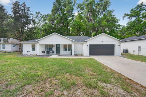 Photo of 115 N Saint Clair Street, Wildwood, FL 34785 (MLS # G5108909)
