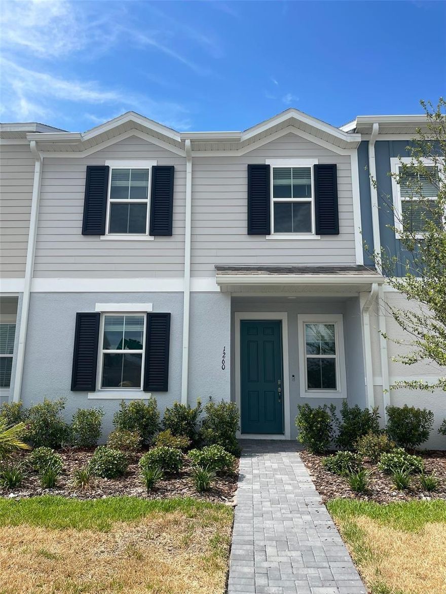 Beautiful newly built townhouse located at 1260 Stockwell Ave in St. Cloud, within the desirable community of Saint Cloud Townhomes. This modern property offers approximately 1,648 square feet of living space with 4 bedrooms and one of them is located on the first floor 3 full bathrooms one of them on the first floor, garage for 2 cars, designed with an open concept floor plan perfect for comfortable living and entertainment. The spacious kitchen features modern cabinets, stone countertops and stainless steel appliances, which connect perfectly with the dining room and living room. Located a few minutes from Lake Nona, Orlando International Airport and major highways such as State Highway 417, this house offers quick access to shops, restaurants, Medical City and top-class schools. Perfect opportunity for families looking for a ready-to-move property in one of the fastest growing areas.