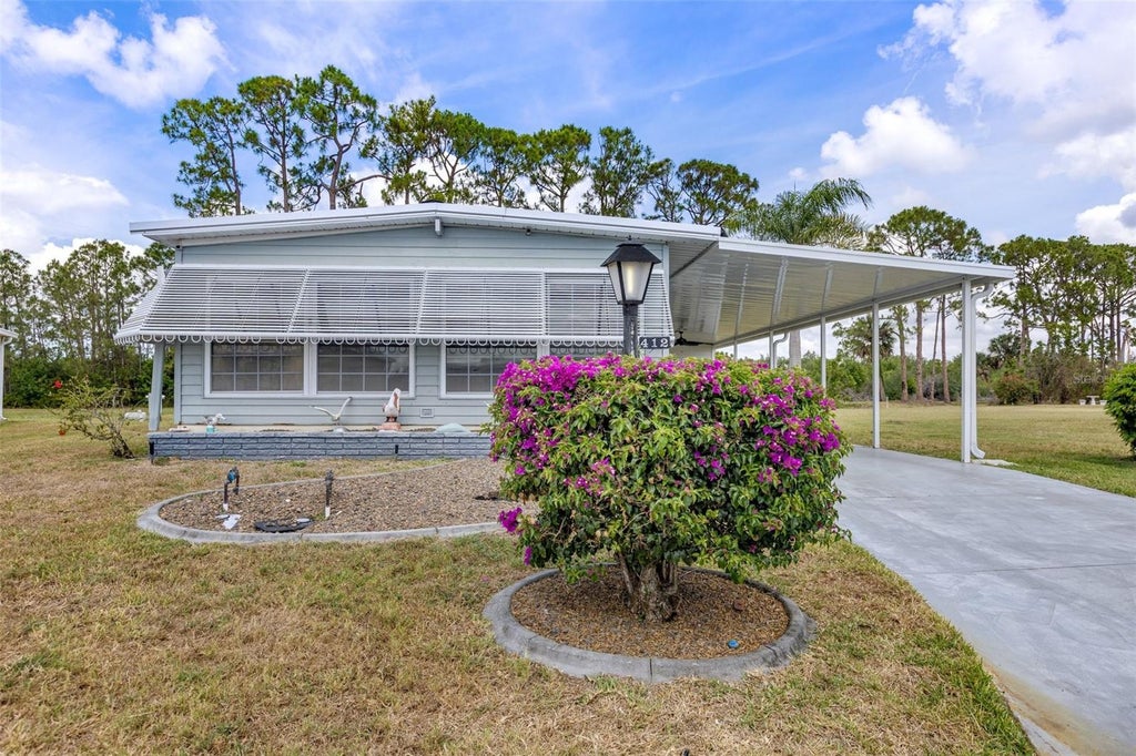Photo of 412 Vivar, North Port, FL 34287 (MLS # TB8559690)