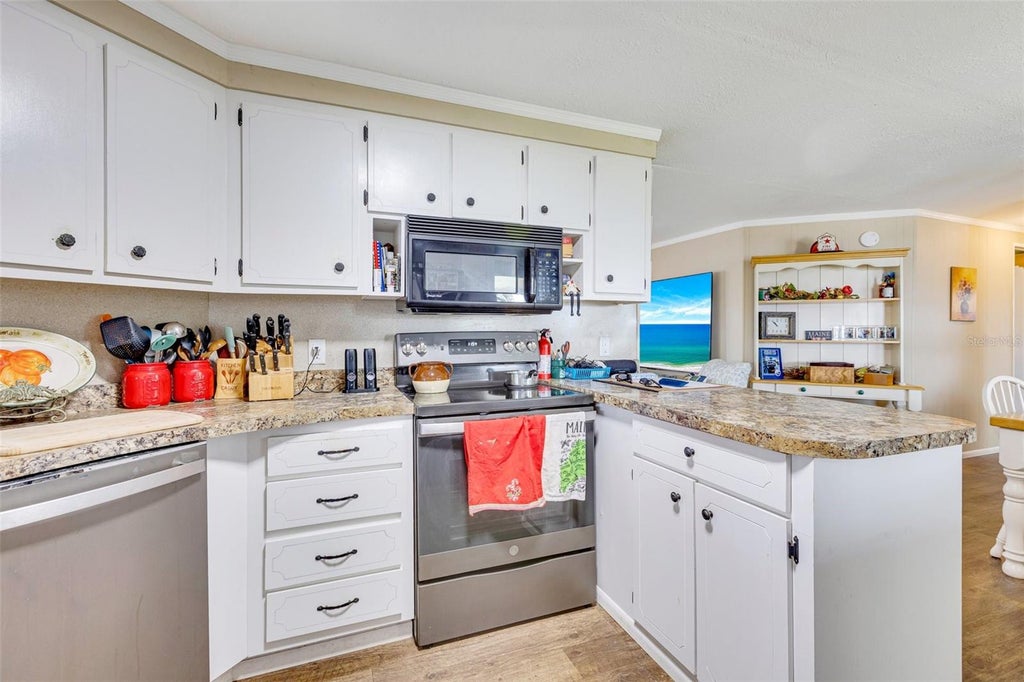 Photo of 412 Vivar, North Port, FL 34287 (MLS # TB8559690)
