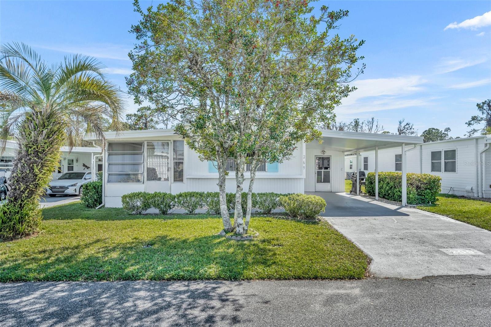 This 2-bedroom, 1-bathroom home is located in a 55+ Co-Op Community in Molokai, where you own a share
of the land. With low HOA fees, the community offers a pool, clubhouse, various clubs, and much more.
Enjoy the Florida Room, perfect for sipping your morning coffee and relaxing in comfort. Don’t miss
out—schedule your appointment today to see this wonderful home!