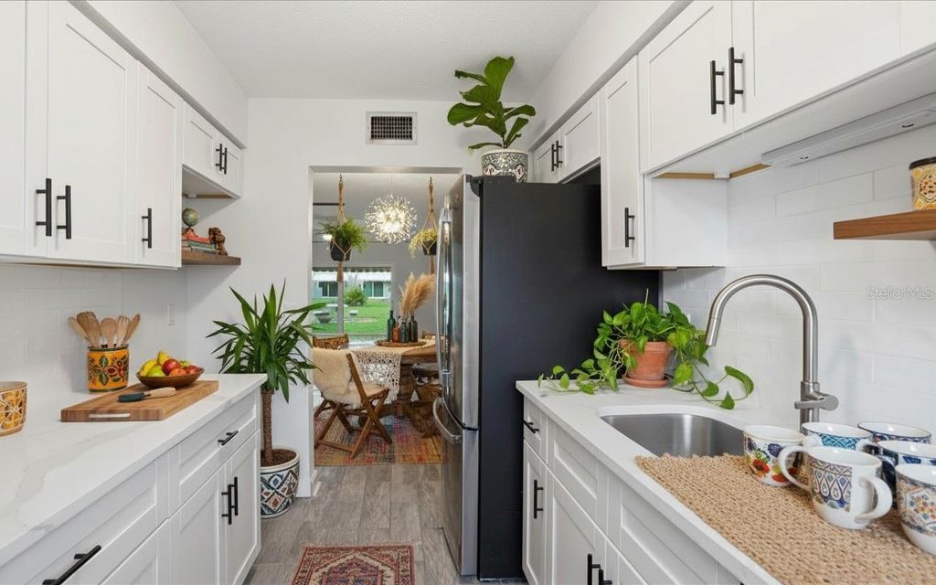 Photo of 6927 Place De La Paix #6927, St Petersburg, FL 33707 (MLS # TB8484534)