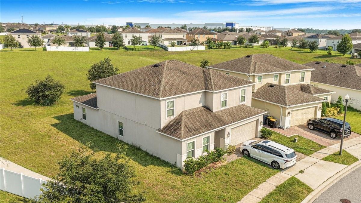 Discover the perfect blend of comfort and elegance in this beautifully designed 6-bedroom, 4.5-bathroom home in the desirable Laurel Estates community of Davenport. Built in 2018 and offering over 3,500 square feet of living space, this two-story residence is ideal for growing families, entertaining guests, or investing in a high-performing rental property.
Step into a bright and open floor plan where the heart of the home is a chef-inspired kitchen featuring a massive island with seating for six, sleek solid-surface countertops, and stainless steel appliances. The spacious living and dining areas flow seamlessly, creating an inviting space for everyday living and special gatherings.
Upstairs, a bonus loft offers flexibility-perfect as a media room, playroom, or second lounge. Each bedroom is generously sized, with walk-in closets and soft carpeting for added comfort. Ceramic tile throughout the main areas adds a touch of style and easy maintenance.
Enjoy the outdoors from your covered rear patio, ideal for morning coffee or evening relaxation. The home sits near a community playground, close enough for convenience, yet far enough for privacy. Laurel Estates is a pet-friendly neighborhood with low HOA fees and a welcoming atmosphere.
Whether you're looking for a forever home or a smart investment, this property delivers. It offers strong potential in a prime location, just minutes from major highways, shopping, dining, and Orlando’s world-famous attractions.