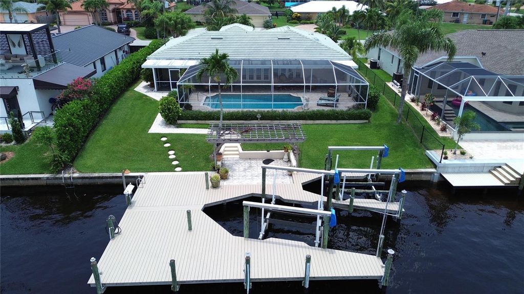 Photo of 2019 SE 28th Terrace, Cape Coral, FL 33904 (MLS # C7516100)