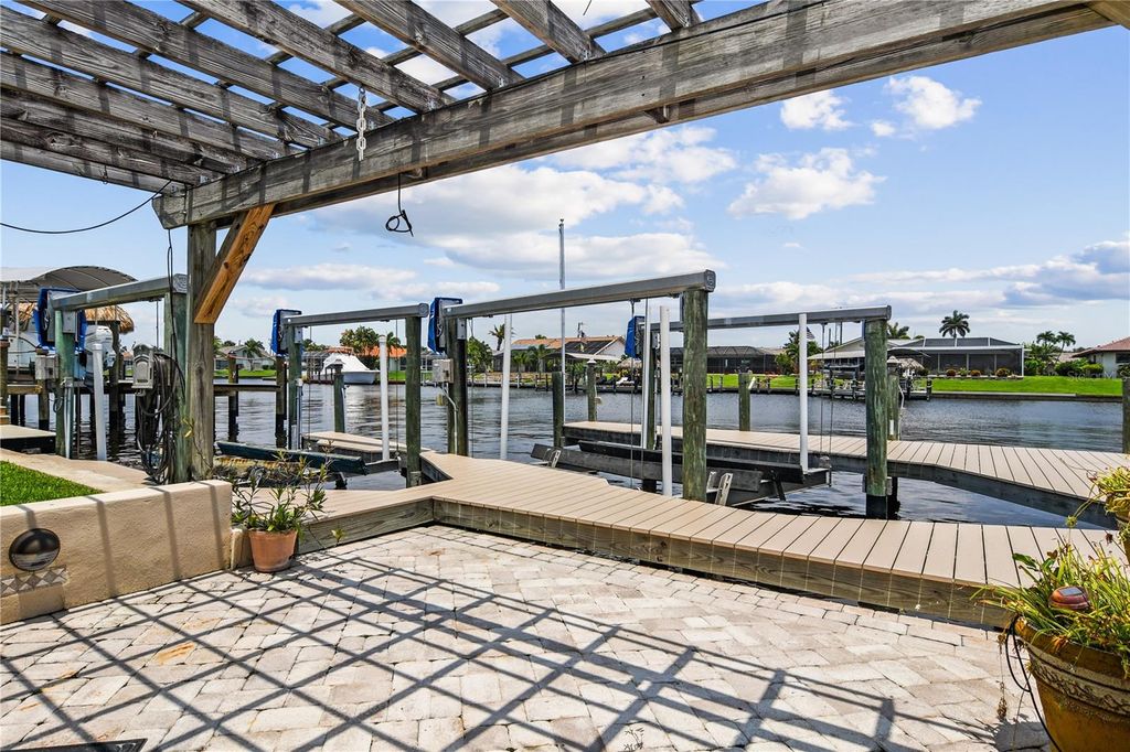 Photo of 2019 SE 28th Terrace, Cape Coral, FL 33904 (MLS # C7516100)