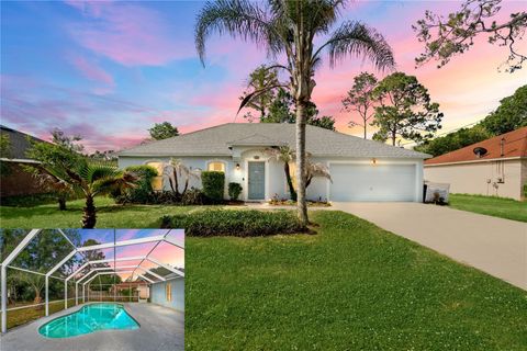 Photo of 85 Sloganeer Trail, Palm Coast, FL 32164 (MLS # FC318167)