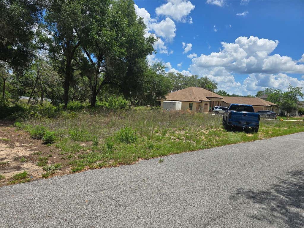 Photo of 5066 Westlake Boulevard, Dade City, FL 33523 (MLS # TB8509751)