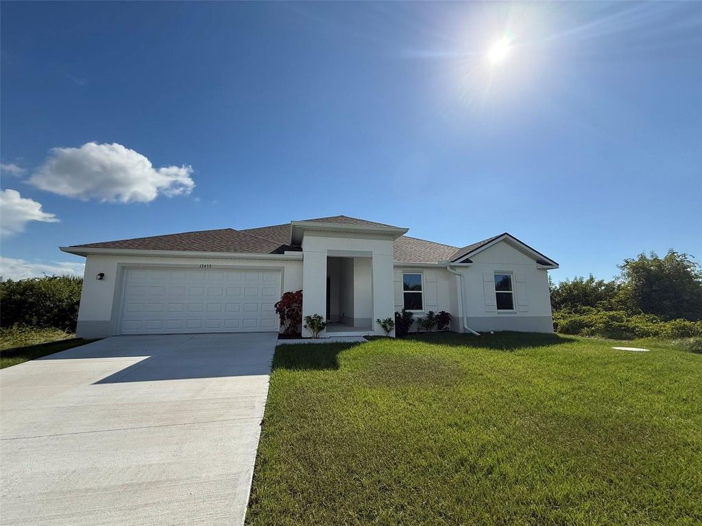 Photo of 13453 Kitchener Avenue, Port Charlotte, FL 33981 (MLS # C7516705)
