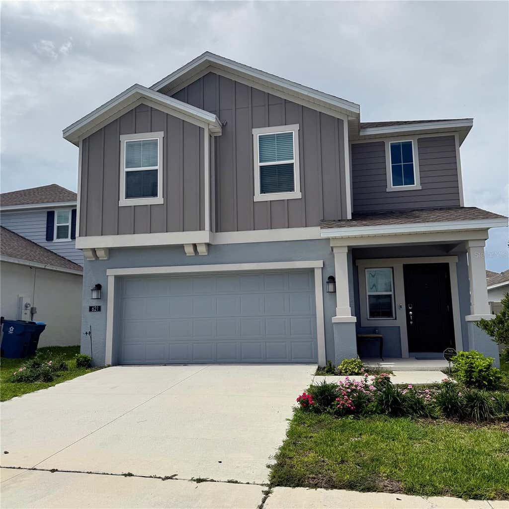 Photo of 621 Sand Pine Lane, Haines City, FL 33844 (MLS # O6414581)