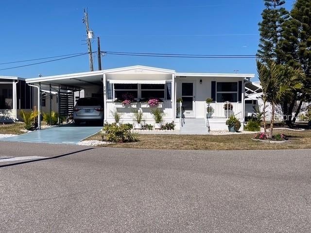 Photo of 740 Carefree, Venice, FL 34285 (MLS # N6146323)
