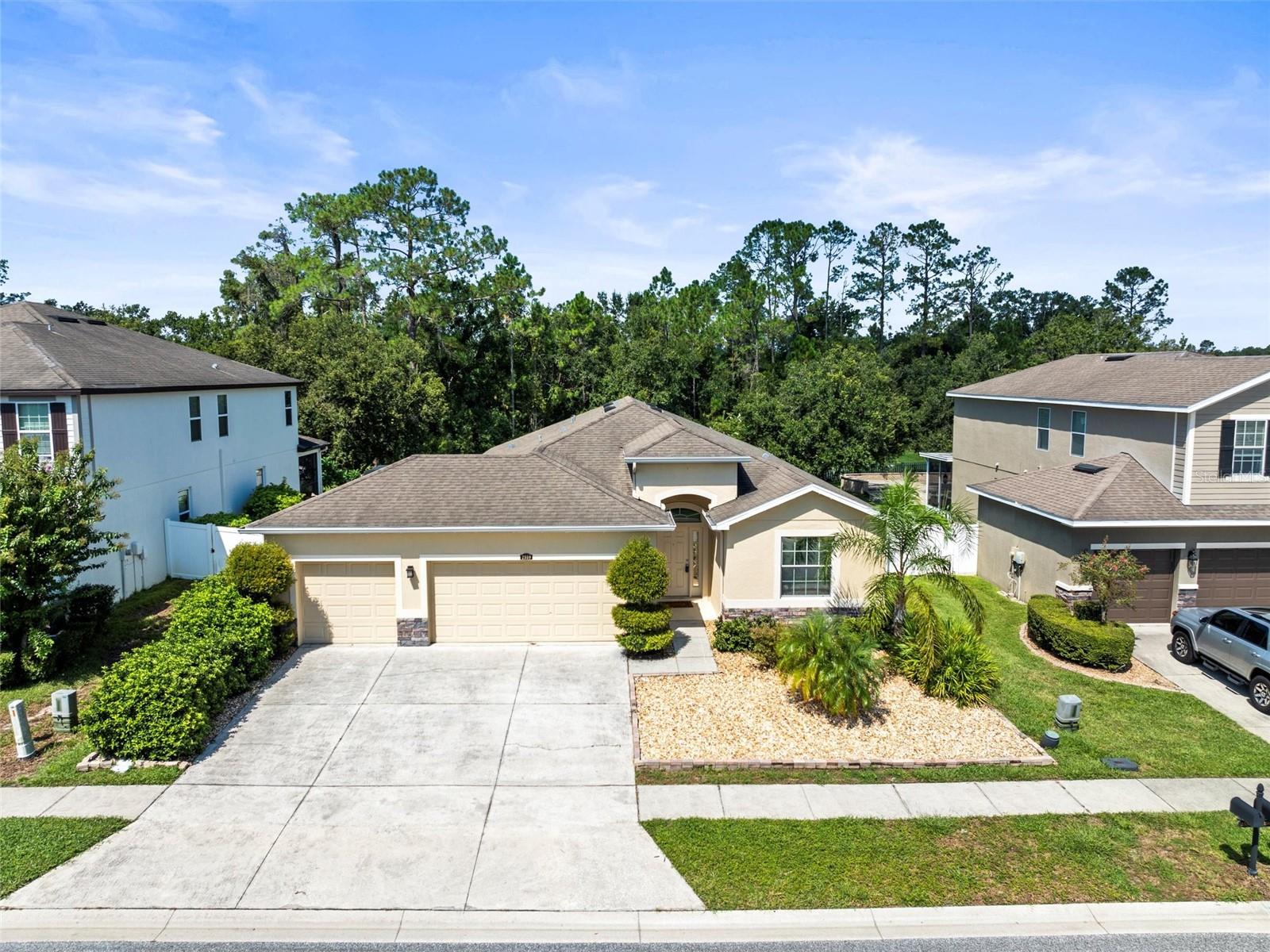 Priced for quick sale, this beautiful single story 4 bedroom, 2.5 bathroom home with 3-car garage, situated on an oversized, fenced premium lot overlooking peaceful conservation is not to be missed.
Just 12 years old, this home offers a desirable three-way split bedroom layout, affording everyone privacy. The open great room design combines the living, dining and kitchen areas, all opening to a screened lanai and large backyard with no rear neighbors—ideal for relaxing or entertaining.
The spacious primary bedroom features two walk-in closets, ensuite bathroom with dual vanities, garden tub, water closet and stand-up shower. Extra parking is easy with space for up to 6 vehicles between the garage and driveway. Residents here also enjoy the convenience of private mailboxes at each home, unlike most newer home communities in Pasco.
Located in the Enclave at Terra Bella with fewer than 300 homes, this quiet, peaceful neighborhood is only 25 minutes north of Downtown Tampa and less than 10 minutes from Tampa Premium Outlets, I-75, and popular dining. The community pool is just a few blocks from your home and features a zero entry pool and splash pad. Just beyond the pool, you'll find popular eateries and local businesses. Land O Lakes Library and Land O Lakes Recreation Complex only are only 2.5 miles away with a playground, skate park, and a host of sports, fitness and community programs.Â
Priced below market, allowing you to choose new bedroom flooring and add your personal touches. A great opportunity not to be missed! Schedule your private showing today!