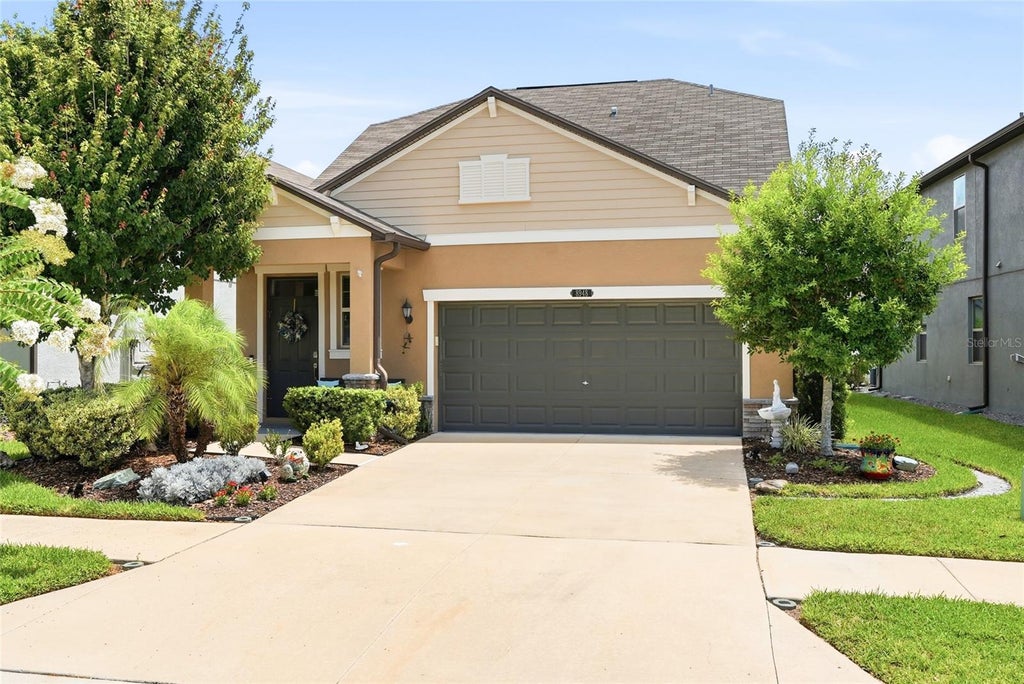 Photo of 8948 Flourish Drive, Land O Lakes, FL 34637 (MLS # TB8536444)
