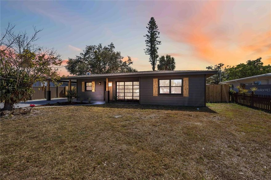 Welcome to 2770 Wood Street, just a couple of short blocks from the Legacy Trail, anchoring you in one of Sarasota’s most desirable spots. This fully remodeled, mid-century modern 4-bed, 2-bath gem radiates warmth and elegance. The heart of the home is the stunning kitchen, featuring expansive quartz countertops, semi custom soft-close cabinets with dovetail craftsmanship, stylish farmhouse sink, and a gleaming suite of matching stainless appliances. The airy, open layout ties together earthy tones, grooved wood paneling enhanced with custom lighting, and brand new luxury vinyl flooring, creating a seamless flow of modern comfort.

This home is not just beautiful but fully upgraded: a brand-new roof (Dec 2024), new windows throughout (2026), a new water heater (2026), and a new AC system (2025) ensure peace of mind. Both bathrooms exude spa-like luxury with sleek tile and modern vanities. Outdoors, the oversized fenced lot features a large storage unit, plus an additional space behind the laundry that could be converted into extra living area. With a covered carport, ample parking for up to five cars, and no HOA or deed restrictions, this property is ideal for Airbnb or long-term rentals.

Situated less than a mile from downtown Sarasota’s bustling arts and dining, about 6 miles to world-renowned Siesta Key Beach, and roughly 5 miles to Lido Key, this location offers the ultimate Sarasota lifestyle—blending comfort, investment potential, and easy access to paradise.