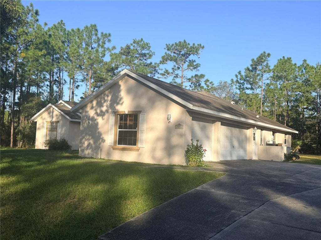 Photo of 4860 N Cimarron Drive, Beverly Hills, FL 34465 (MLS # W7890499)