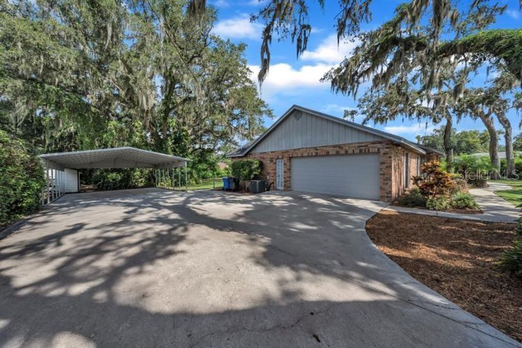 Photo of 302 Old Mulrennan Road, Valrico, FL 33594 (MLS # TB8400212)