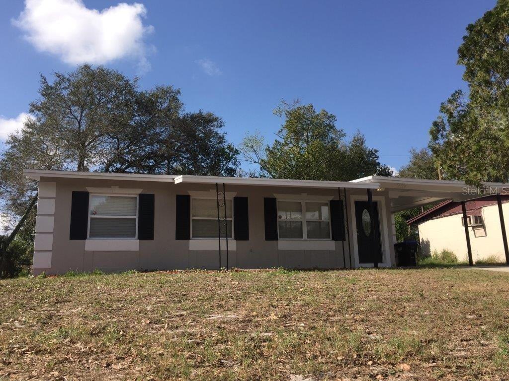 Photo of 1412 Sunridge Road, Orlando, FL 32808 (MLS # O6446196)