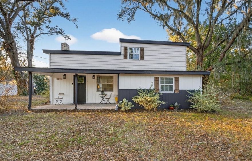Escape to your own private sanctuary in North Lakeland. Tucked away on nearly an acre of land, this completely renovated 3-bedroom, 2-bathroom eclectic home offers a rare blend of tranquil country living and modern design.
Step inside and be captivated by the dramatic high ceilings, accented by solid wood beams that exude rustic charm. The heart of this home is the expansive great room, anchored by a magnificent brick fireplace. The massive, open-concept kitchen and dining area is an entertainer's dream, featuring sleek stainless steel appliances and stunning Quartz countertops. Functionality meets style with a dedicated flex space, perfect for a home office or business.
The thoughtful layout includes two guest rooms and a full bath downstairs, while the upstairs is dedicated to a serene primary suite, complete with a private en suite bathroom and a walk-in closet.
Enjoy extensive recent upgrades, including a brand-new shingle roof, a newer HVAC system (2024), and updated electrical and plumbing (2024). This property is equipped with an advanced UV water sterilization system for well water and a new shed in the backyard for additional storage. Ultimate privacy and tranquility, with dedicated space for your RV, boat, and other toys offering a blank canvas for your ultimate country-living vision.