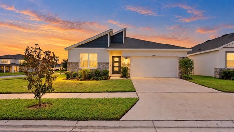 Photo of 31938 Treasure Dock Isle, Wesley Chapel, FL 33545 (MLS # TB8556974)